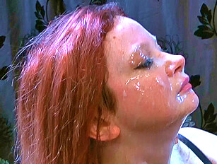 Round Faced Redhead Gets a Facefull of Cum