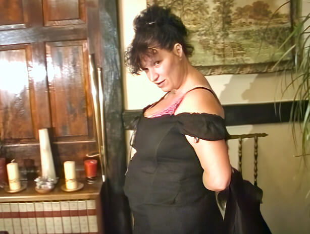 Stripping at home revealing her big naturals