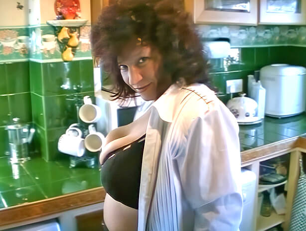 Sexy Kim early striptease in the kitchen