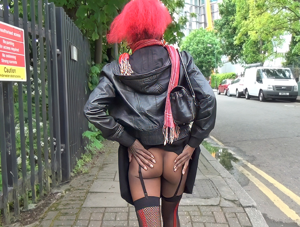 Ebony redhead walks in public in fishnet stockings flashing her pussy and ass
