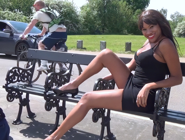 Sexy ebony in a little black dress gets nude in public